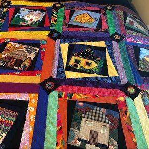 Handmade Quilt. Colorful Handmade Homes Patchwork Quilt.